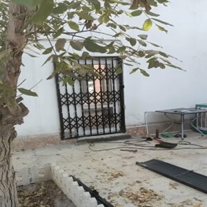 درب آکاردئونی آپارتمان در سیرجان