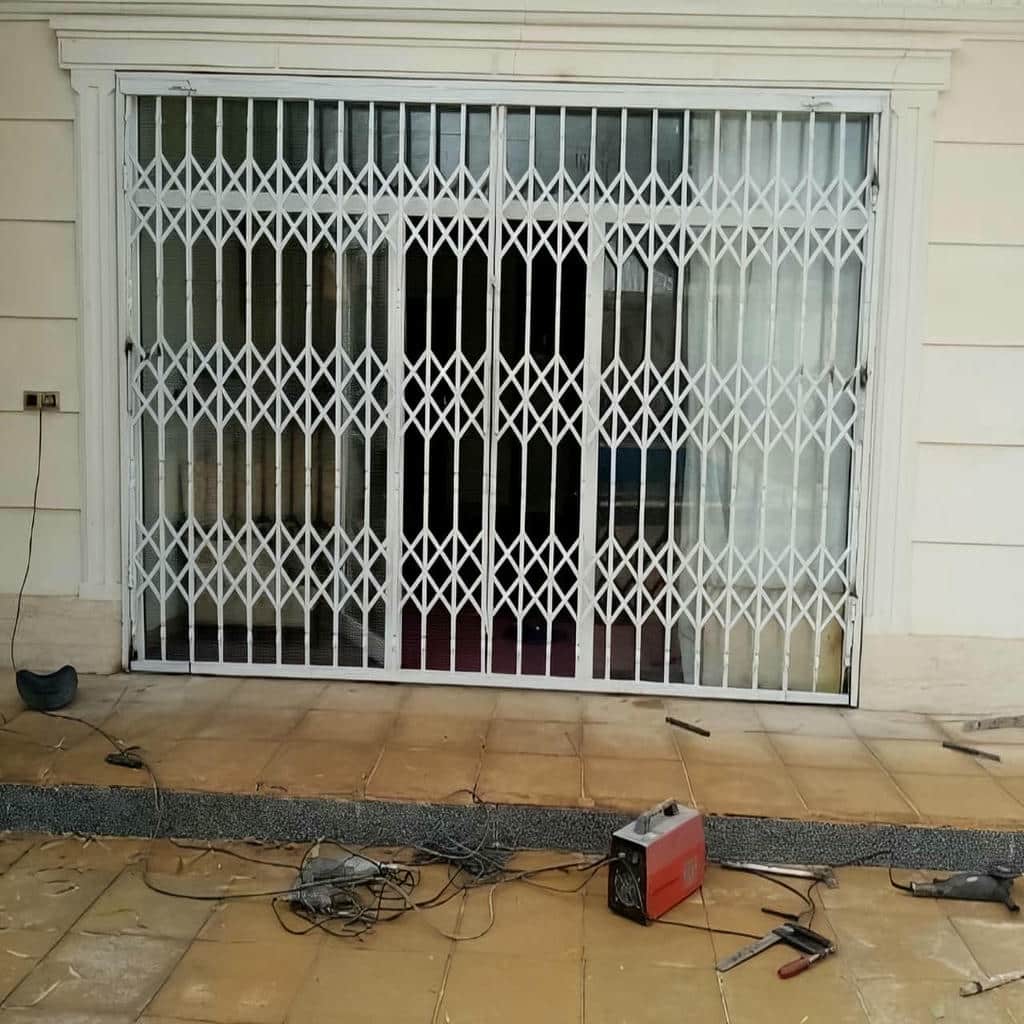 خرید درب آکاردئونی حفاظ آپارتمان ضدزنگ در شهریار