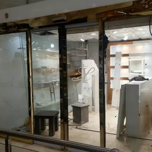 قیمت درب لولایی اتوماتیک شیشه ای
