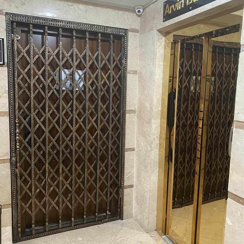 خرید درب آکاردئونی پنج گل دوبل برای ورودی مسکونی