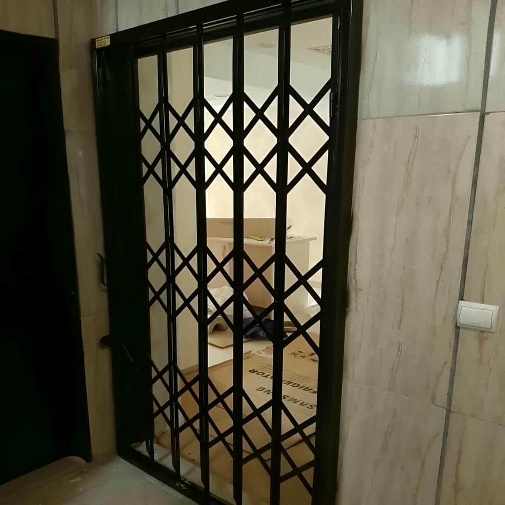 خرید درب آکاردئونی طلایی سلطنتی برای ورودی واحد