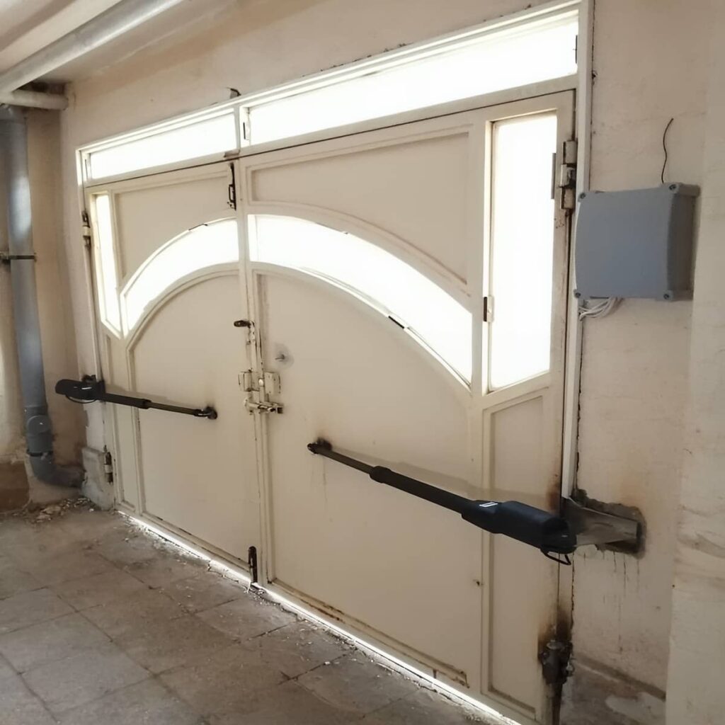 اجرای درب برقی پارکینگ ریلی با زیرسازی استاندارد